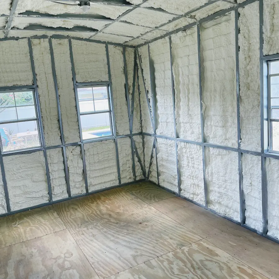 Closed-cell spray foam insulation applied to wall cavities in a residential project in Morrisville