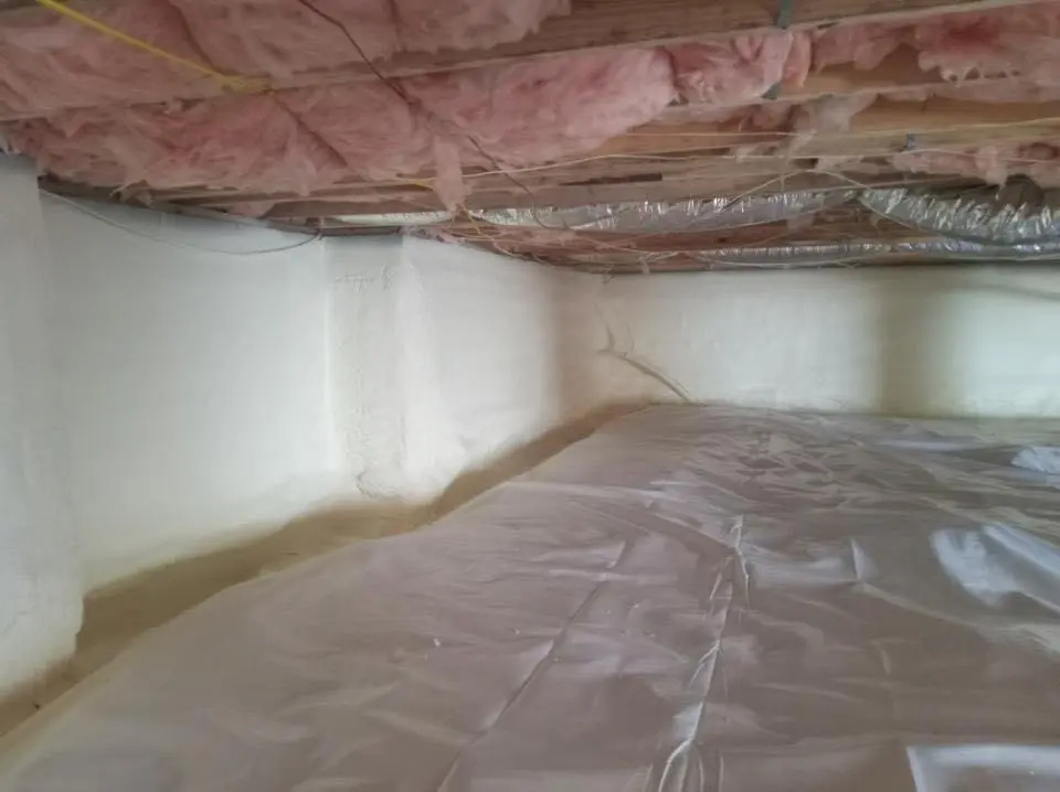 Crawl space encapsulation with closed-cell spray foam for Commercial Roof Restoration in Morrisville